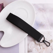 Black nylon wrist strap with black clip and attachment loop