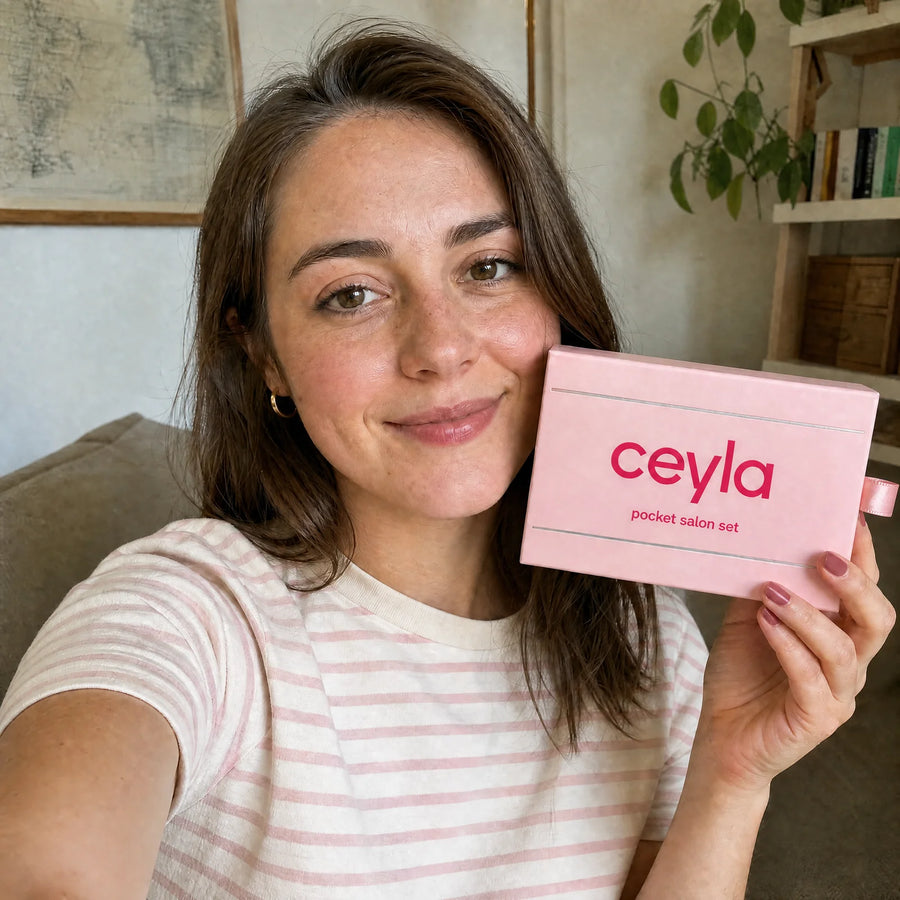 Campaign selfie holding the blush Ceyla Pocket Salon Set packaging preview.