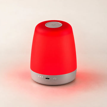 NightNest nursery light glowing red.