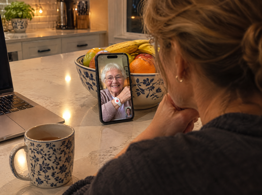 Daughter on a video call with her mother, who shows the band