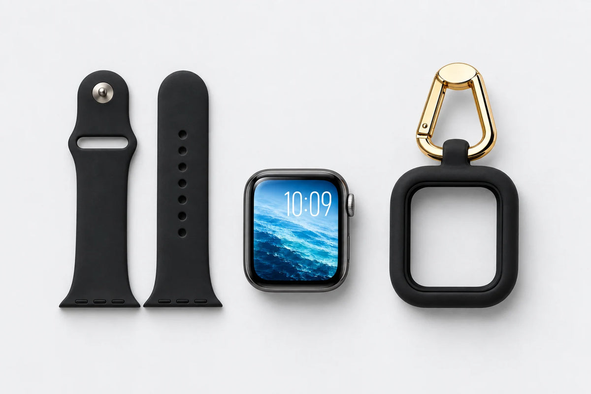 A watch with its bands removed beside the empty ReLoop case and clip. Watch and watch bands not included.