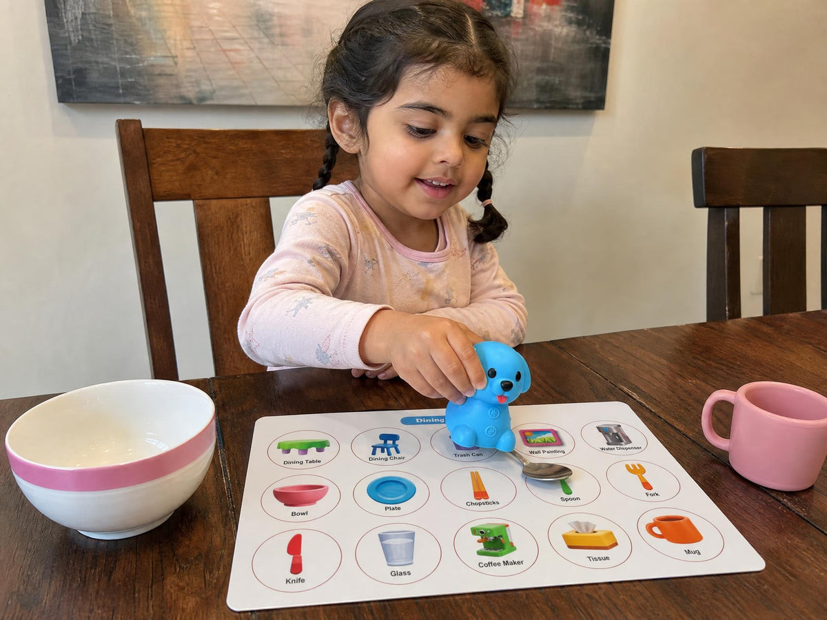 A child exploring the Ceyla Puppy Reader Dining room board in a matching home setting