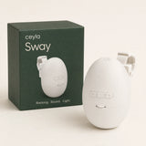 Ceyla Sway white stroller rocker beside its forest-green Ceyla retail box