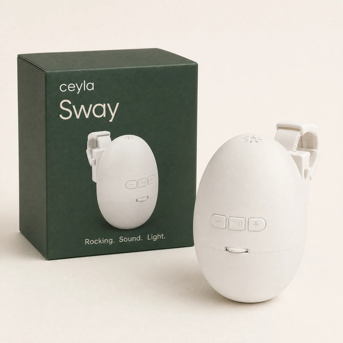 Ceyla Sway white stroller rocker beside its forest-green Ceyla retail box