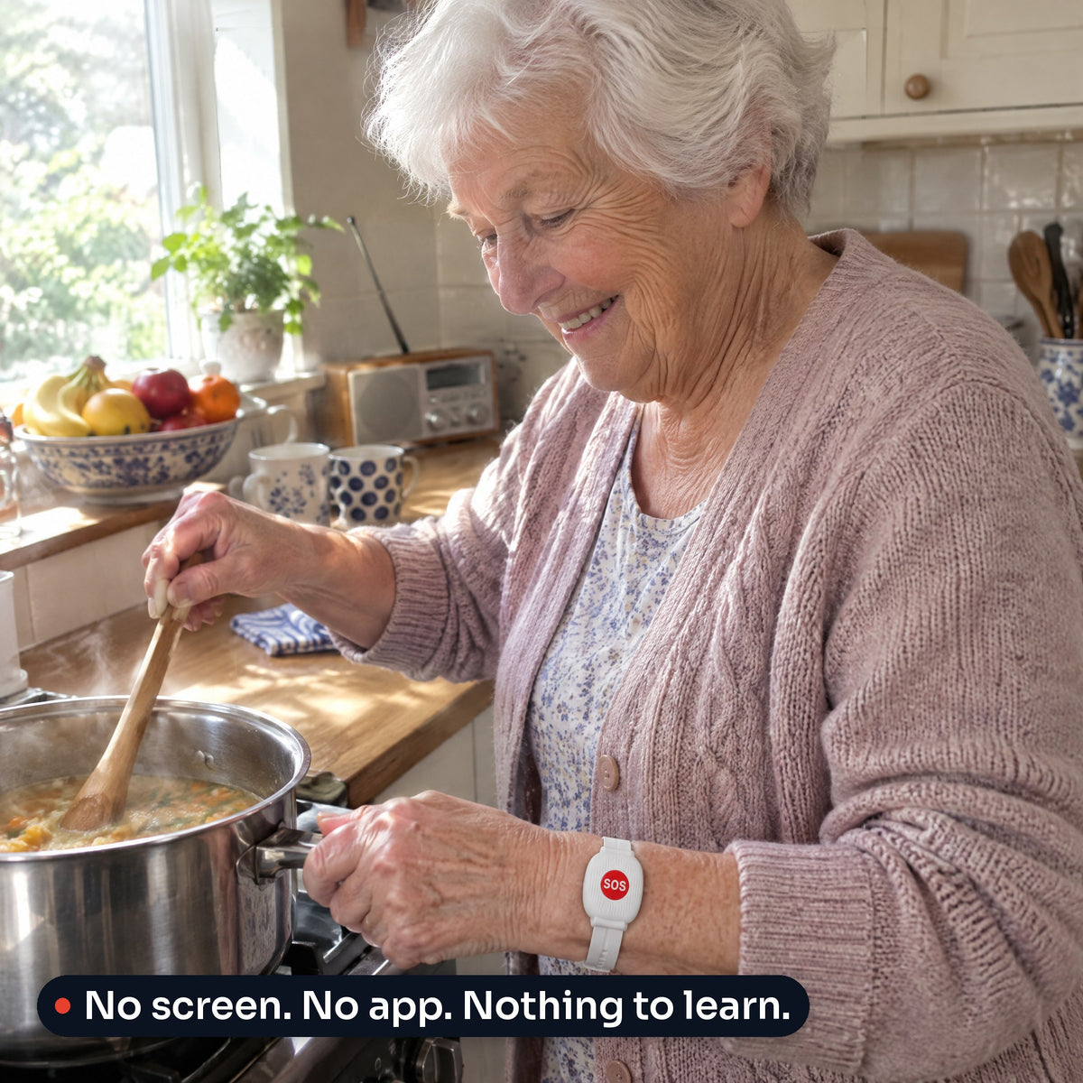 Grandmother cooking in her kitchen wearing the Reach band